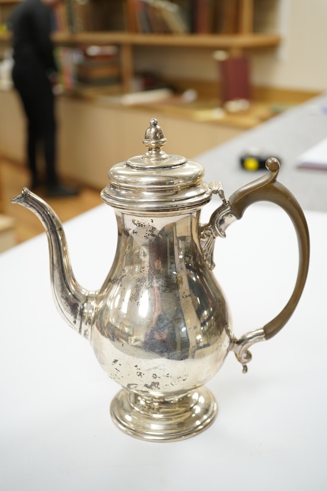 A George VI small silver coffee pot, maker CE?, London, 1936, height 20cm, gross weight 15.3oz. Condition - fair